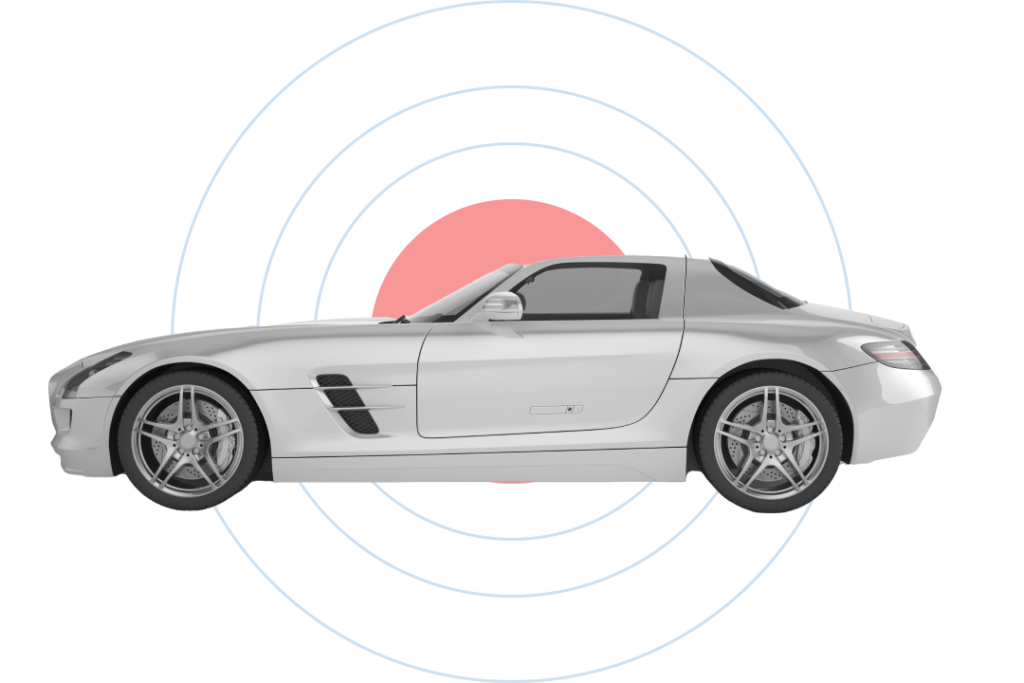 A silver sports car with a sleek design is shown in profile view against a red and blue concentric circle background.